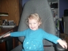In Papa's chair.