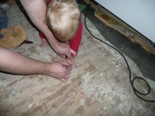 Tracing LiliBee's hands.